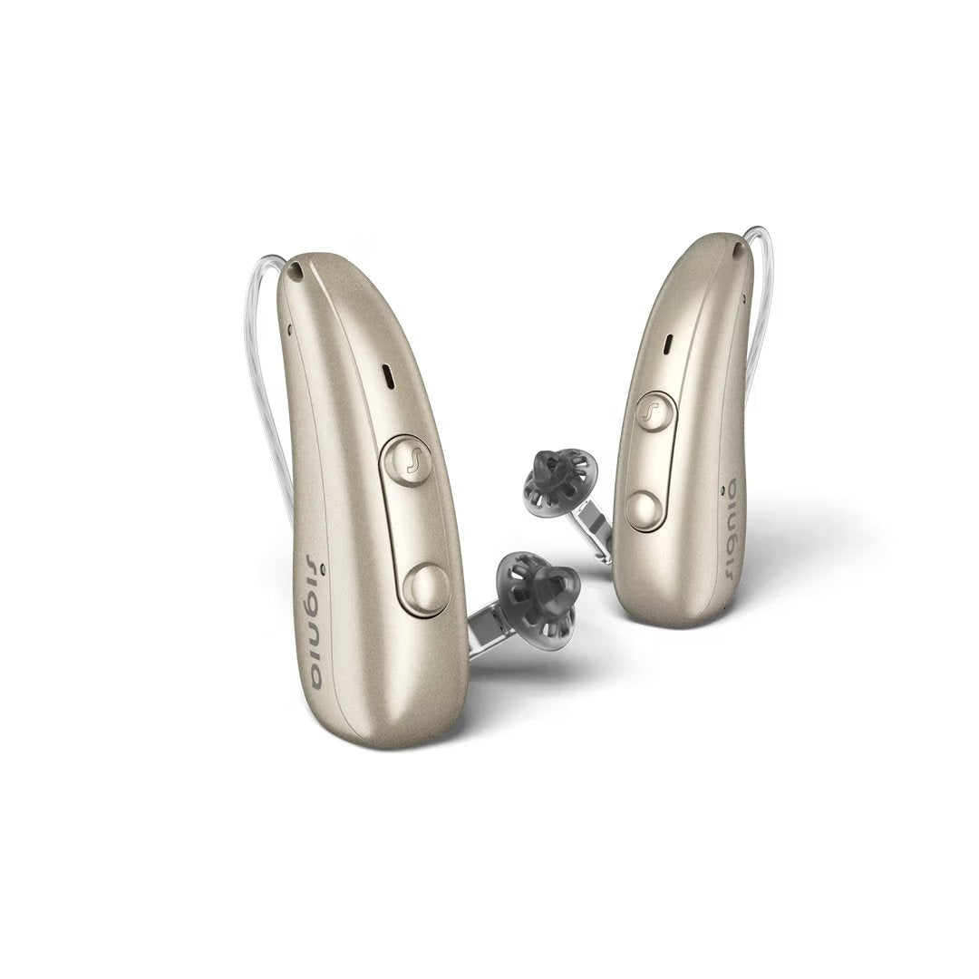 Et par Signia Pure høreapparater i lys beige