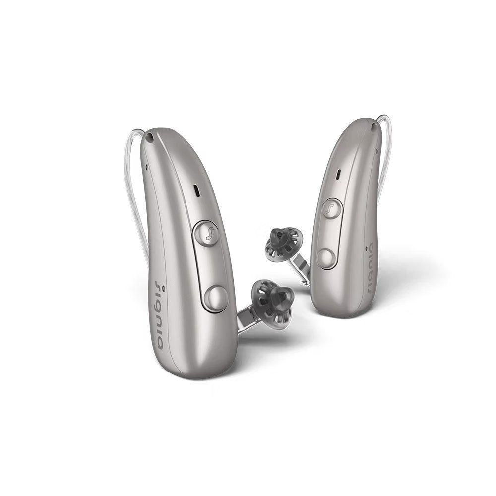 Et par Signia Pure høreapparater i solv